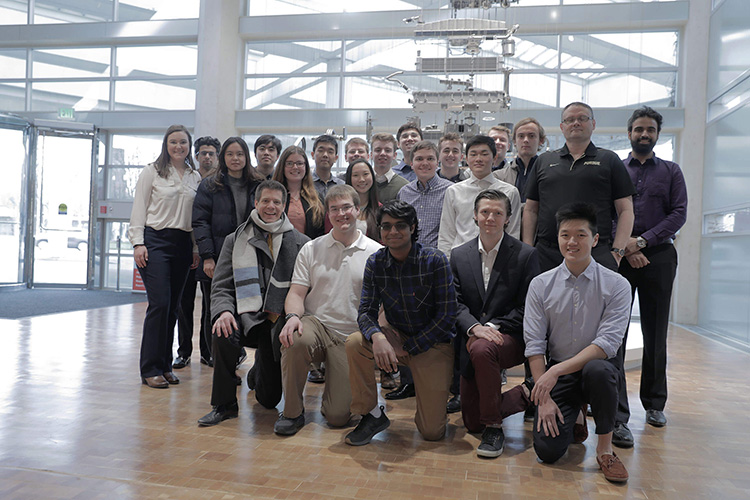 Mark Daniel Ward (first row, far left) and students from The Data Mine visit Cummins in Columbus, Ind., on March 4, prior to social distancing. Fifteen students currently are working on a data science project with Cummins. (Matthew Kerkhoff/Purdue University)