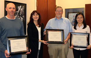 Pictured, (L to R): Patrick Devlin, Interim Dean of Purdue Libraries, Rhonda Phillips, Dave Huckleberry, and Huimei Delgado.