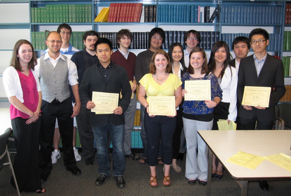 Outstanding mathematics students with their awards.