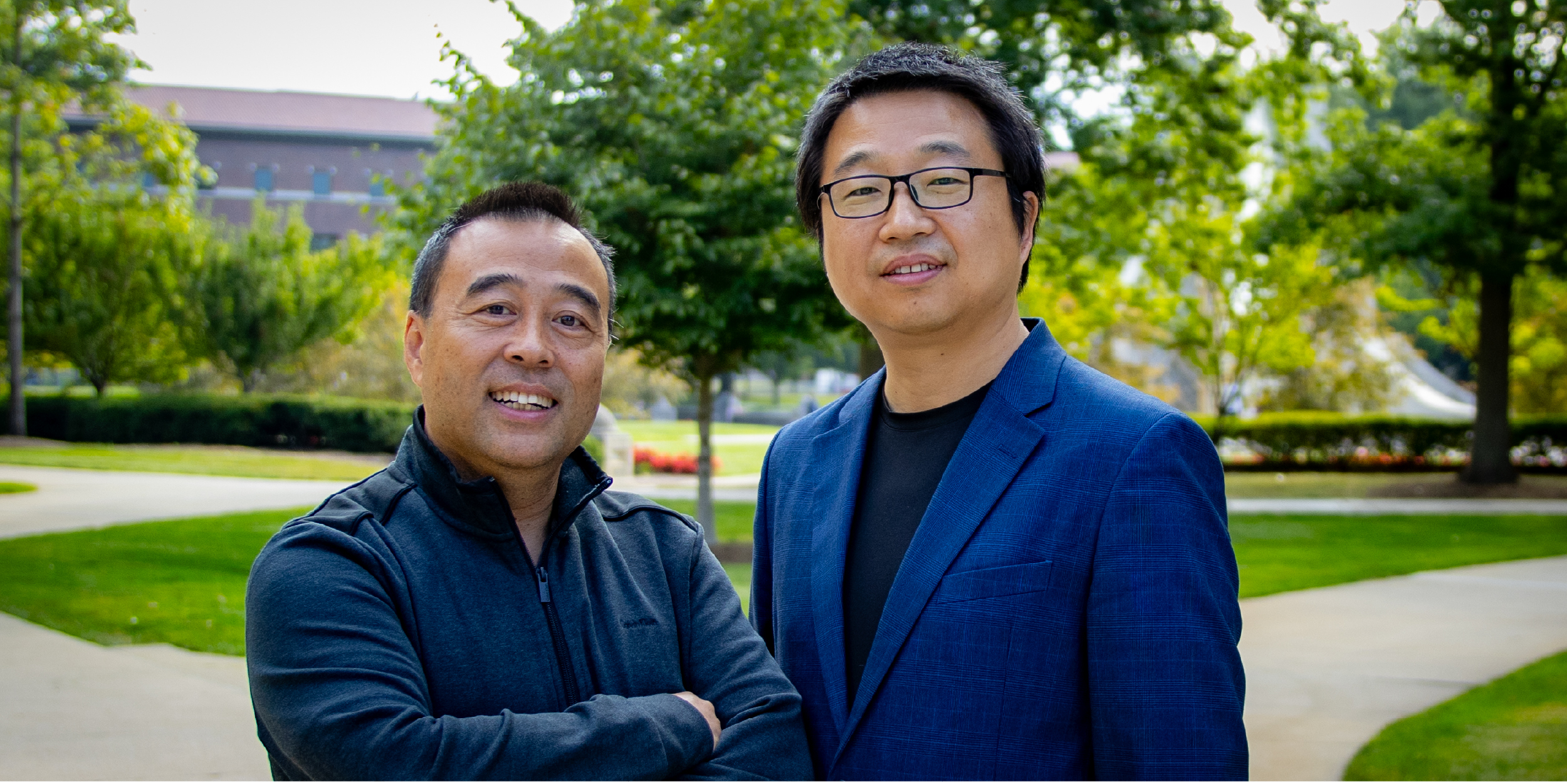 Guang Lin and Wenzhuo Wu stand together on the campus of Purdue University (Photo by David Montgomery)