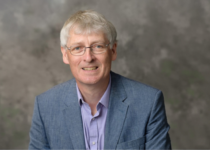 Headshot of Trevor Wooley